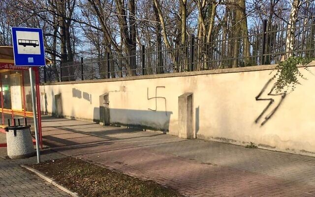 Swastika and SS symbol on the Jewish cemetery near Auschwitz (Credit: Auschwitz museum on Twitter)