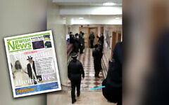 Screen-grab from JN video of police intervening at a shul in Stamford Hill where a simcha is taking place