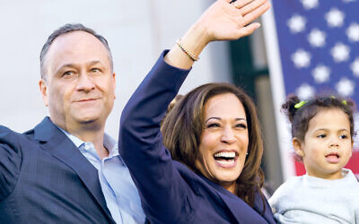 Kamala Harris waves to crowds alongside her Jewish husband Doug Emhoff