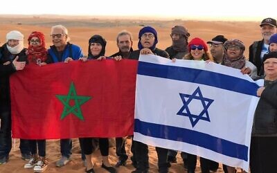 The national flags of Morocco and Israel.