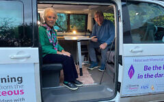 Eva Clarke with Anthony in his van Eva Clarke with Anthony in his van