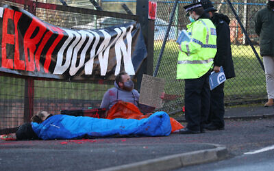 Protesters block the entrance to Israeli-owned Elbit Ferranti arms company in Oldham, Greater Manchester.