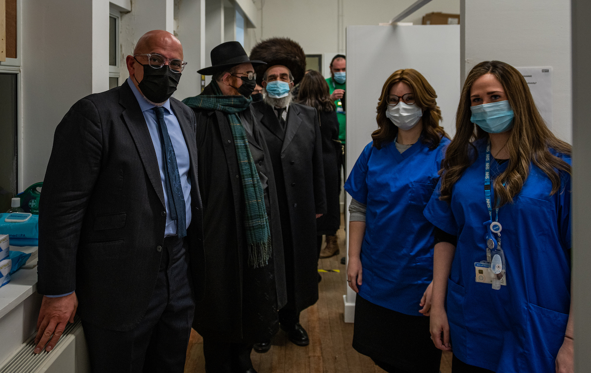 Vaccination volunteers with Nadhim Zahawi, Parliamentary Under-Secretary of State for COVID-19 Vaccine Deployment since 2020
