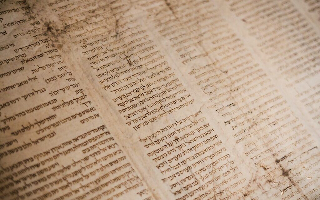Torah scroll (Photo by Tanner Mardis on Unsplash)