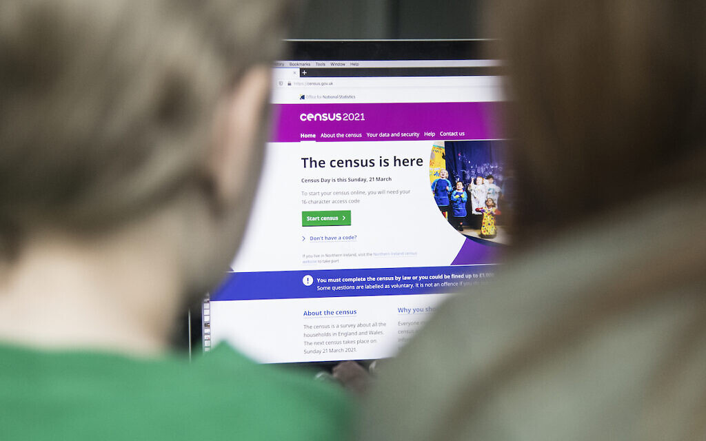 A family completing their Census form online