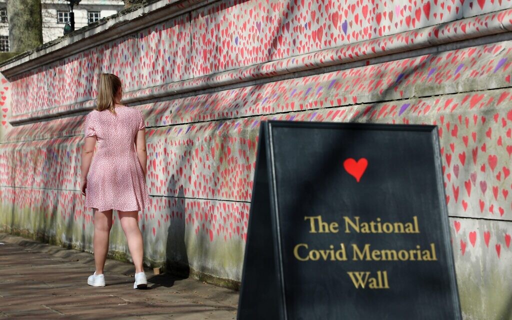Hearts of the National Covid Memorial drawn by the Bereaved Friends and Family of Covid-19 on the embankment of the River Thames opposite the Houses of Parliament.