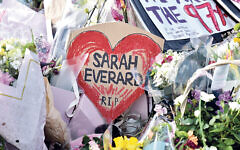 People paying their respects and laying floral tributes for Sarah Everard at the bandstand in Clapham Common, the day after the cancelled vigil. Credit: Matthew Chattle/Alamy Live News People paying their respects and laying floral tributes for Sarah Everard at the bandstand in Clapham Common, the day after the cancelled vigil. Credit: Matthew Chattle/Alamy Live News