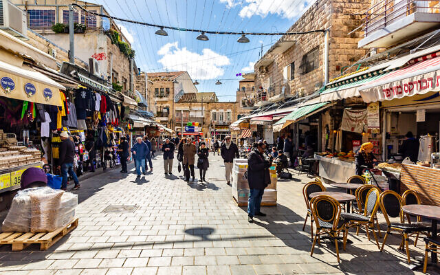 People shopping at Mahane Yehuda Jerusalem marke.