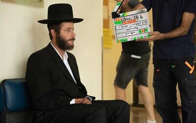 Michael Aloni, who plays Akiva, during filming of Shtisel series 3. Credit: Vered Adir