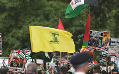 A Hezbollah flag during the Al-Quds rally in London in 2016 (Photo credit: Steve Winston)