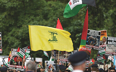 A Hezbollah terror flag during the Al-Quds rally in London in 2016 (Photo credit: Steve Winston)