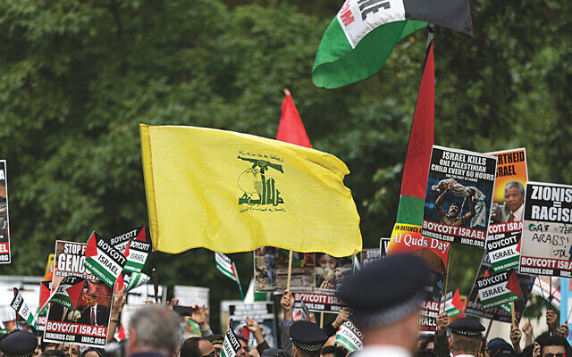 A Hezbollah terror flag during the Al-Quds rally in London in 2016 (Photo credit: Steve Winston)