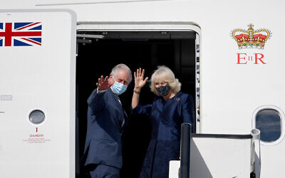 The Prince of Wales and the Duchess of Cornwall wave as they board a flight at Athens International Airport, Greece, after a two-day visit to Greece to celebrate the bicentenary of Greek independence.(PA Wire/PA Images/Victoria Jones)