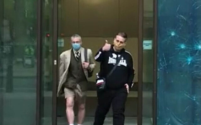 Ben Raymond (right), leaving Wesminster Magistrates' Court