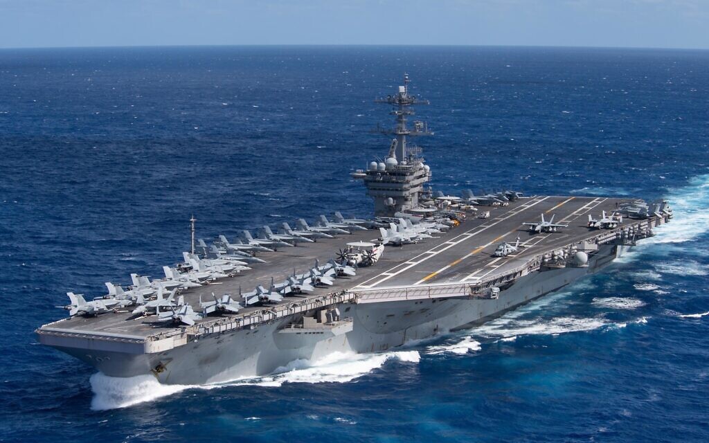 The aircraft carrier USS Theodore Roosevelt (CVN 71) transits the Pacific Ocean Jan. 25, 2020  (WIKIPEDIA/U.S. Navy photo by Mass Communication Specialist Seaman Kaylianna Genier / https://www.dvidshub.net/image/6045208/uss-theodore-roosevelt-cvn-71 )