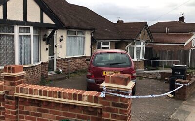 A photo taken at the time of a police cordon outside a bungalow in Rushden Gardens in Ilford, where Loretta Herman was found dead