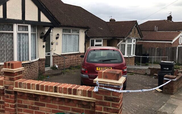 A photo taken at the time of a police cordon outside a bungalow in Rushden Gardens in Ilford, where Loretta Herman was found dead