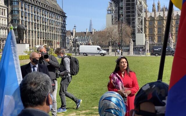 Nus Ghani speaking at a rally outside Parliament with Uyghur activists. (Credit: @finnlau_cd on Twitter)