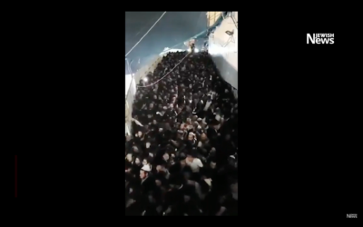 Screenshot from Jewish News' video about the tragic incident. The crowds were crushed in a narrow walkway