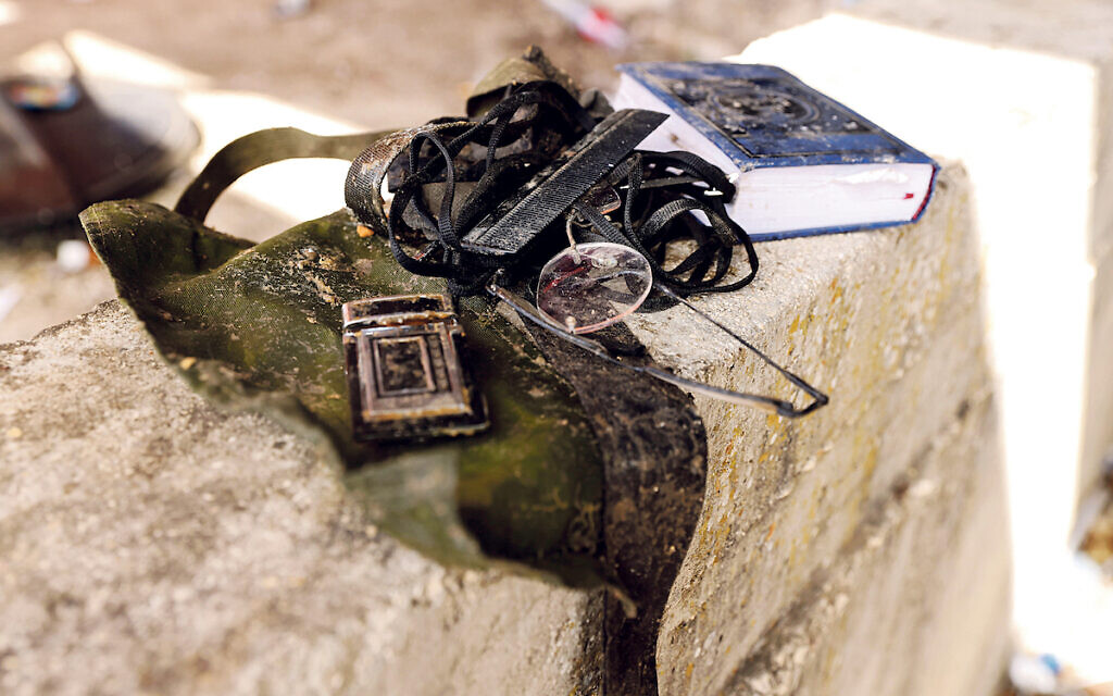 Personal belongings of Orthodox Jews can be seen on Mount Meron, northern Israel, where fatalities were reported among the thousands of ultra-Orthodox Jews gathered at the tomb of a 2nd-century sage for annual commemorations that include all-night prayer and dance, April 30, 2021. REUTERS/ Ronen Zvulun