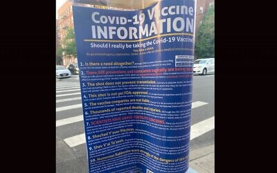 A poster encouraging people not to get COVID-19 vaccines in an Orthodox neighbourhood of Brooklyn.