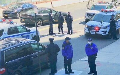 New York police officers respond to an attack at one of four synagogues in the Riverdale section of the Bronx, April 26, 2021. (NYPD via Twitter)