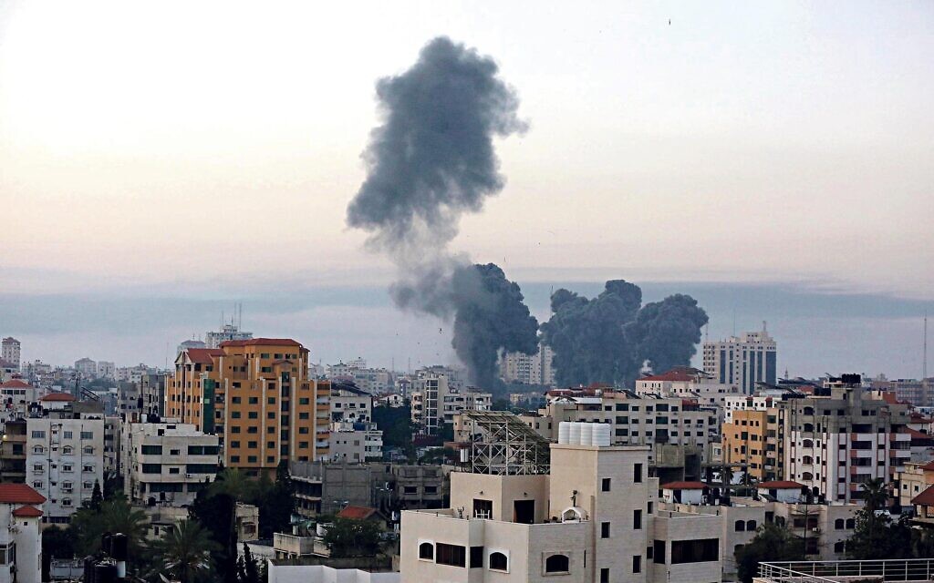 Smoke rise after an Israeli airstrike in Gaza City