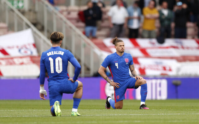 England's Jack Grealish and Kalvin Phillips take a knee before the international friendly match at Riverside Stadium, Middlesbrough. Picture date: Sunday June 6, 2021.
