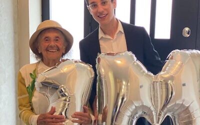 Lly and Dov celebrate with balloons after reaching 1m followers on their TikTok account (Image: Dov Forman)