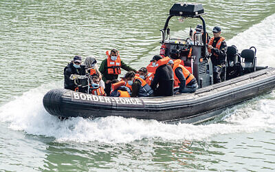 Migrants being brought on shore by the border force at Dover (Jewish News)
