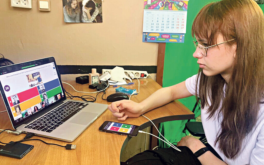 Student Karina Smirnova in St Petersburg takes part in the ORT Day quiz