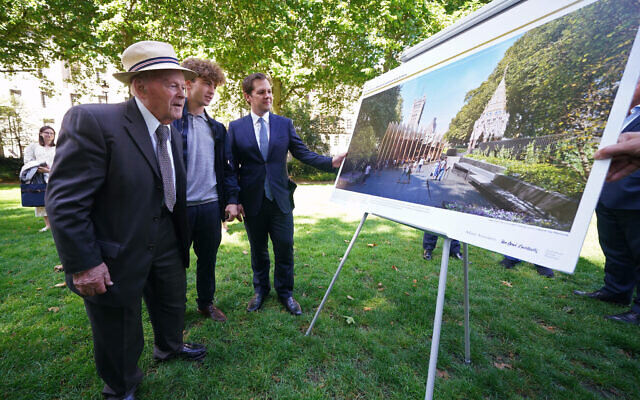 Housing Secretary Robert Jenrick (right), holocaust survivor Sir Ben Helfgott and his grandson Reuben at Victoria Gardens in Westminster, London, celebrating the go-ahead being given to a Holocaust memorial. Picture date: Thursday July 29, 2021.