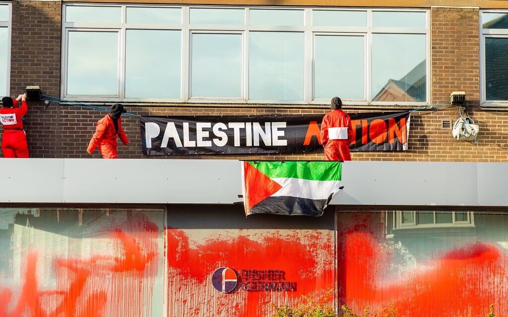 Activists on top of the building during earlier action (Credit: Palestine Action on Twitter)