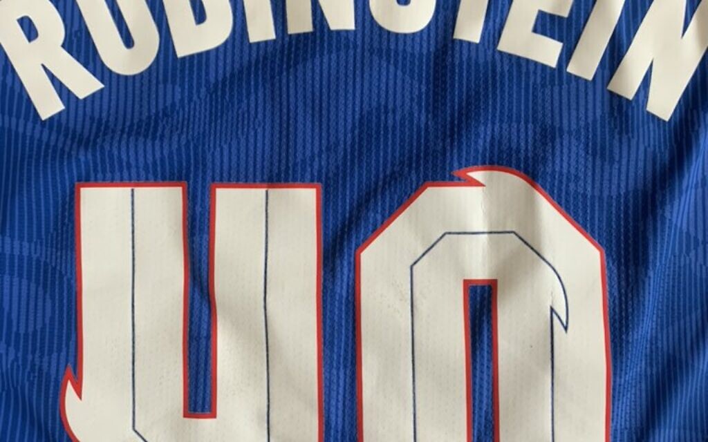 Jolyon Rubinstein's England shirt proudly has his surname on the back.