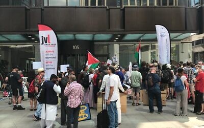 JVL banner can be seen at a small demonstration