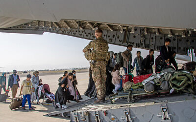MoD handout photo of British citizens and dual nationals residing in Afghanistan being relocated to the UK, as part of Operation PITTING, the UK Armed Forces are enabling the relocation of personnel and others from Afghanistan. Issue date: Monday August 16, 2021.