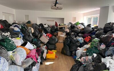 Black bags with donated items were piled high