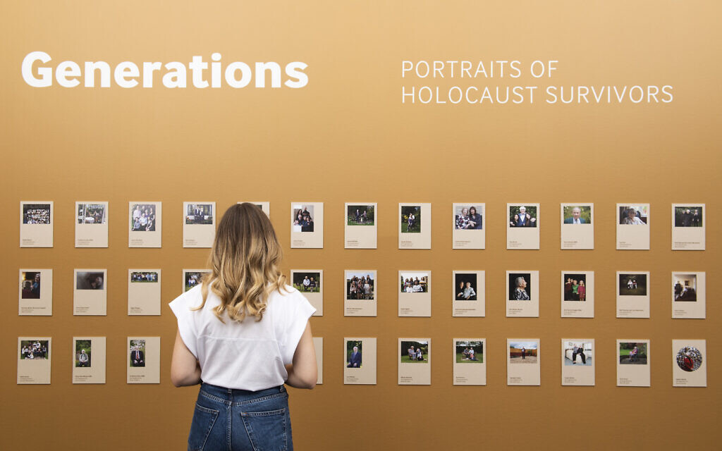 © IWM (1471)
A visitor explores Generations: Portraits of Holocaust Survivors at IWM London.