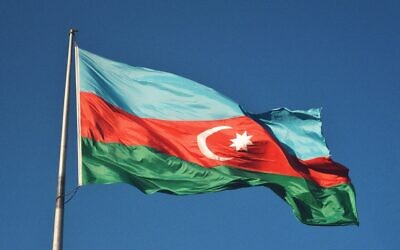 Azerbaijan's flag (Photo by Hikmat Gafarzada on Unsplash)