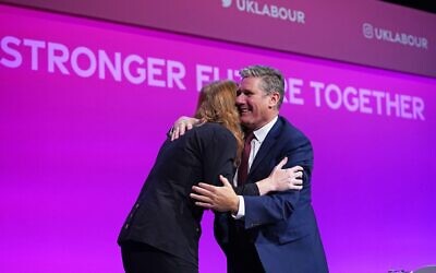 2GNG0CB Labour Party leader Sir Keir Starmer congratulates deputy leader Angela Rayner after her speech at the Labour Party conference in Brighton. Picture date: Saturday September 25, 2021.