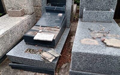 Some of the vandalized graves at the Tablada Jewish cemetery near Buenos Aires. (Courtesy of AMIA)