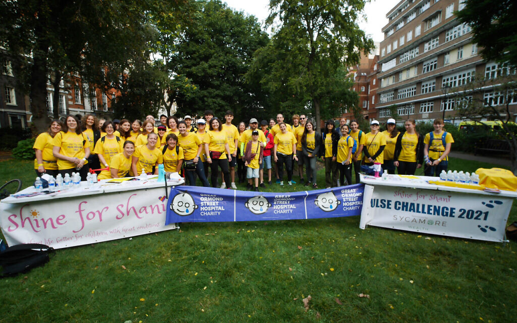 More than a hundred brightly dressed walkers put their best feet forward and raised £50,000 in memory of five-year-old Shani Berman, from Elstree, who died from a rare heart condition