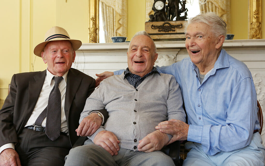 (l to r) Sir Ben Helfgott, Jan Goldberger and Harry Spiro pictured at a lunch inside Holmehurst, the original Loughton hostel, now a privately owned residence owned by Wendy and Richard Higgins, who opened up their home to a group of 80 members of the '45 Aid Society, including the 3 Loughton Boys and their families as well as other Boys and local dignitaries (credit: Melissa Page)