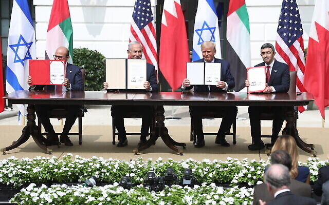 Dr. Abdullatif bin Rashid Al Zayani, Minister of Foreign Affairs for the Kingdom of Bahrain, Benjamin Netanyahu, Prime Minister of the State of Israel, U.S. President Donald J. Trump and Abdullah bin Zayed Al Nahyan, Minister of Foreign Affairs and International Cooperation of the United Arab Emirates sign papers during the Abraham Accords Signing Ceremony at The White House on Tuesday, Sep. 15, 2020 in Washington, DC. (Photo by Oliver Contreras/SIPA USA)