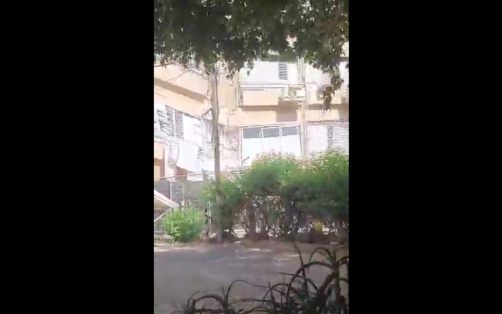 An apartment building in Holon collapsed just a day after being evacuated. (Screenshot from Twitter)