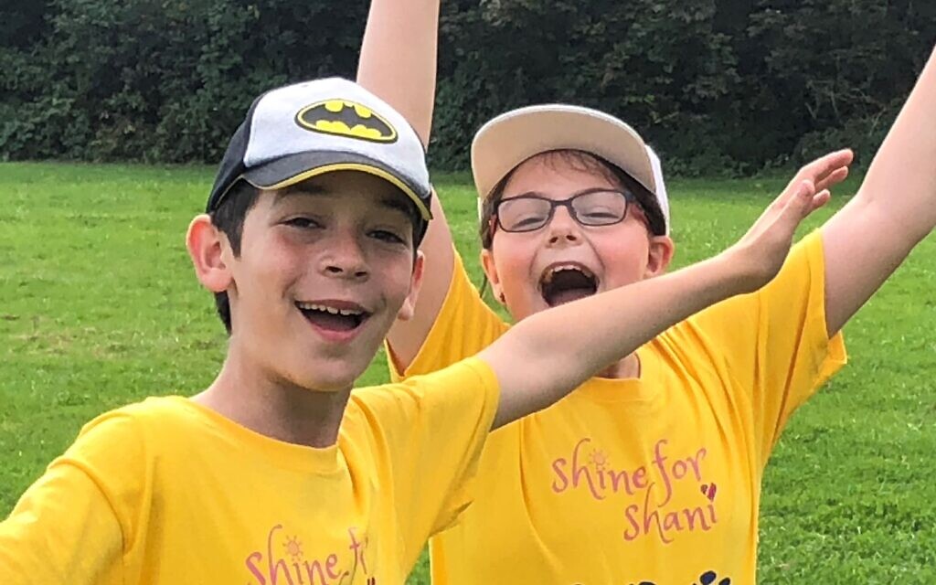 More than a hundred brightly dressed walkers put their best feet forward and raised £50,000 in memory of five-year-old Shani Berman, from Elstree, who died from a rare heart condition