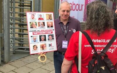 'Gary', a member of JVL protests outside the conference