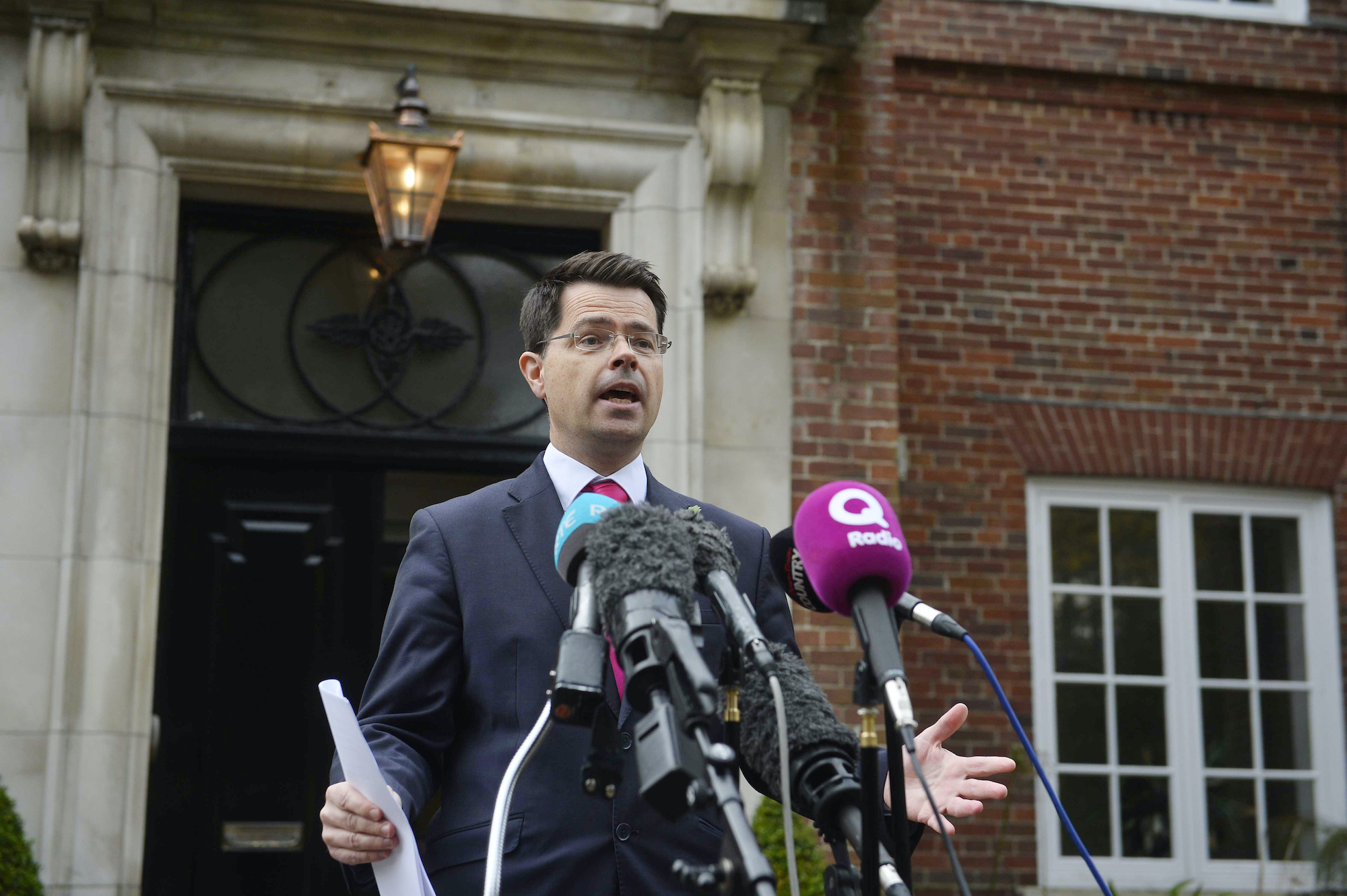 James Brokenshire speaking to the media outside Stormont House in Belfast.