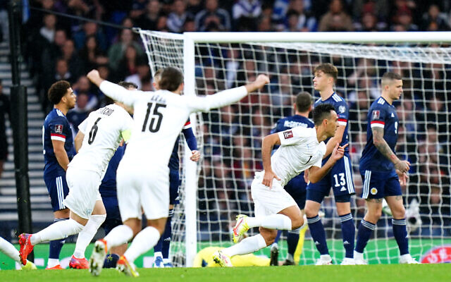 Israel's Eran Zahavi (right) celebrates scoring their side's first goal of the game during the FIFA World Cup Qualifying match at Hampden Park, Glasgow. Picture date: Saturday October 9, 2021.