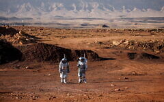 Scientists participate in a demonstration of an experiment led by Austrian and Israeli agencies simulating a mission to Mars near Mitzpe Ramon, Israel October 10, 2021. REUTERS/Amir Cohen